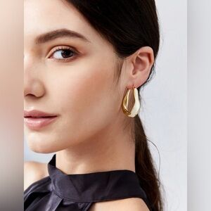 Gold asymmetric modern design hoop earrings